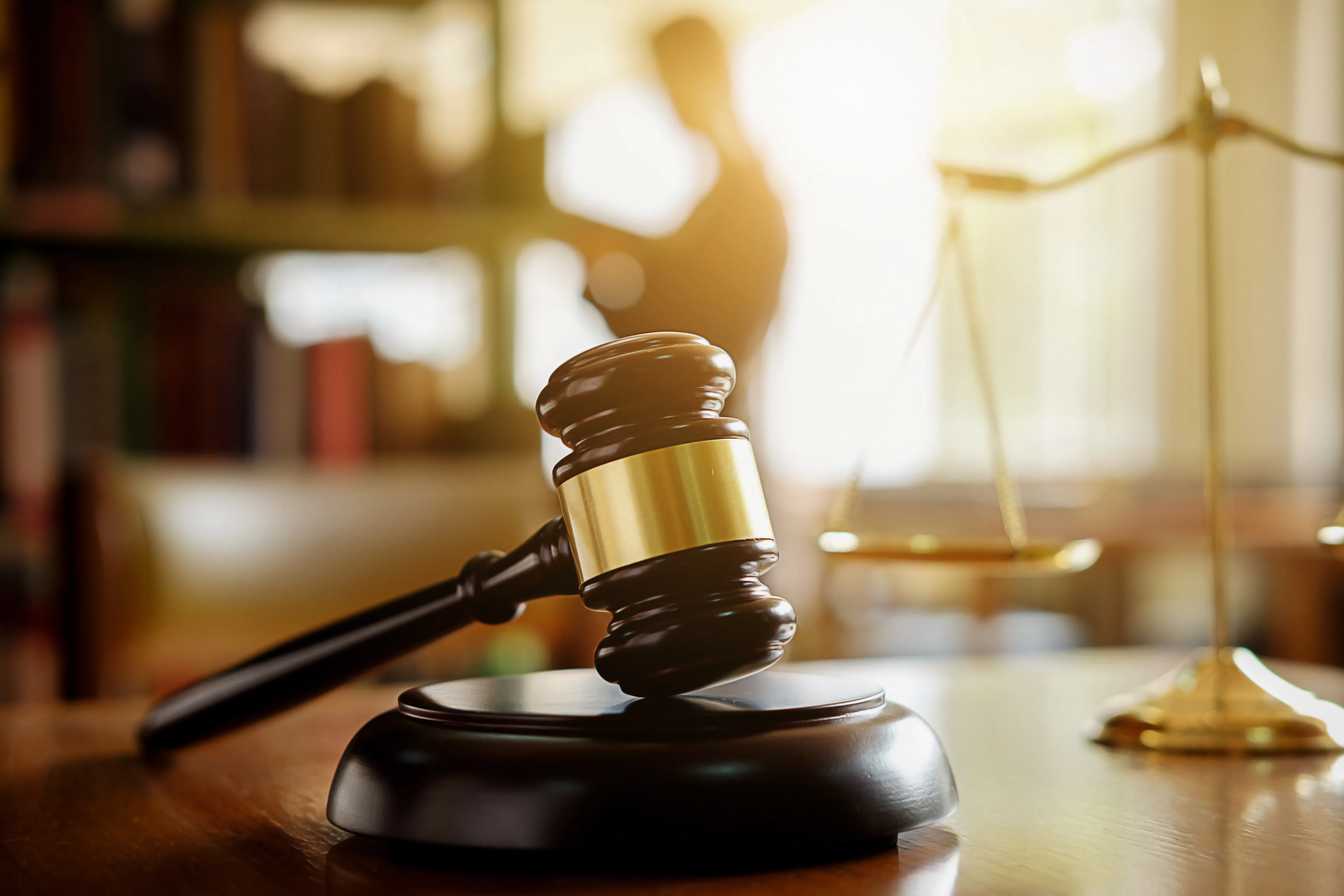 Law firm gavel and scales of justice